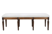 Large early 20th Century French walnut banquette in the Neo-Classical style.