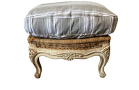 Large French footstool in the Louis XV style with feather-filled cushion upholstered in ticking. 