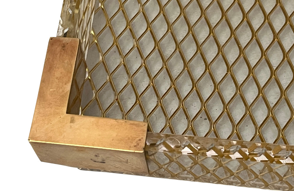 Large lucite tray with brass corners and embedded mesh with two incorporated handles sitting on a separate brass stand.