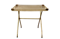 Large lucite tray with brass corners and embedded mesh with two incorporated handles sitting on a separate brass stand.