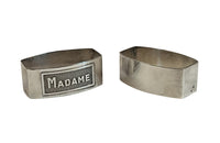 Very smart pair of silver plate napkin rings with Madame & Monsieur Art Deco lettering in rectangular cartouches. 