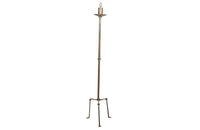 1950's Spanish gilt iron floor lamp of great decorative design with ringed stem and angular tripod base.
