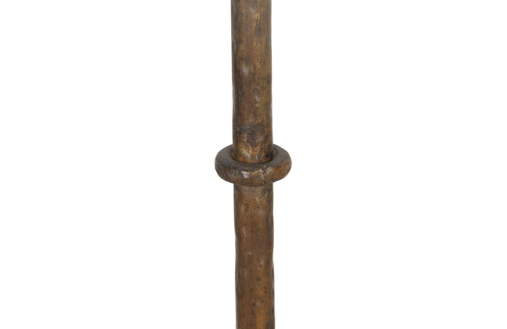 1950's Spanish gilt iron floor lamp of great decorative design with ringed stem and angular tripod base.