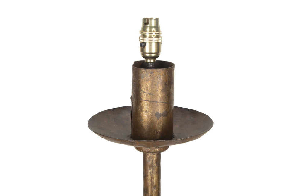 1950's Spanish gilt iron floor lamp of great decorative design with ringed stem and angular tripod base.