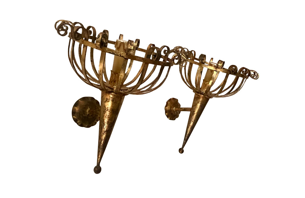 Pair of mid-20th Century Spanish gilt metal wall sconces in the form of torcheres