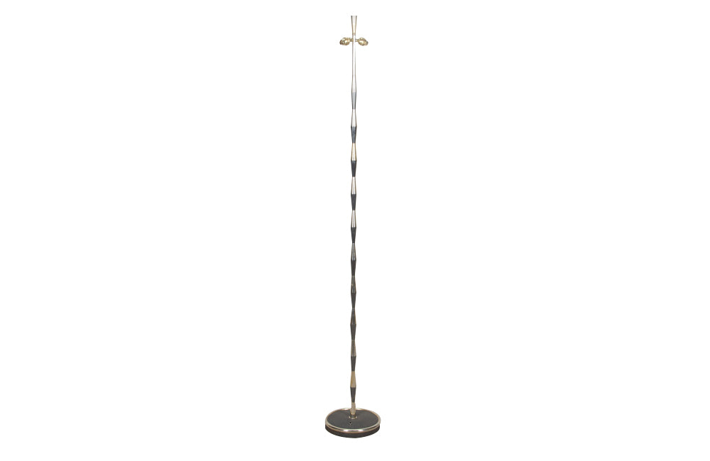 Mid-20th Century French floor lamp with gunmetal and brass striped finish.
