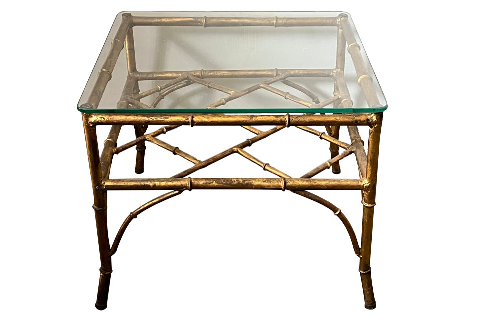 20th Century French square gilt metal faux bamboo coffee or end table with clear glass top.