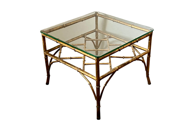 20th Century French square gilt metal faux bamboo coffee or end table with clear glass top.