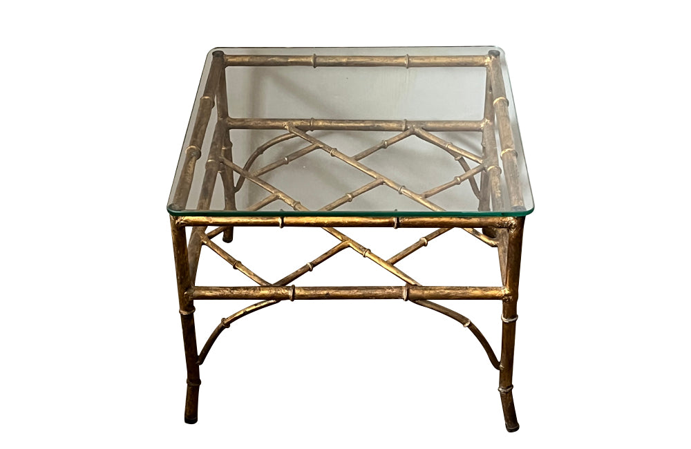 20th Century French square gilt metal faux bamboo coffee or end table with clear glass top.