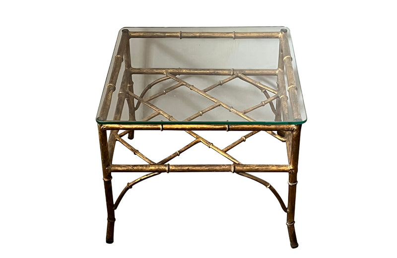 20th Century French square gilt metal faux bamboo coffee or end table with clear glass top.