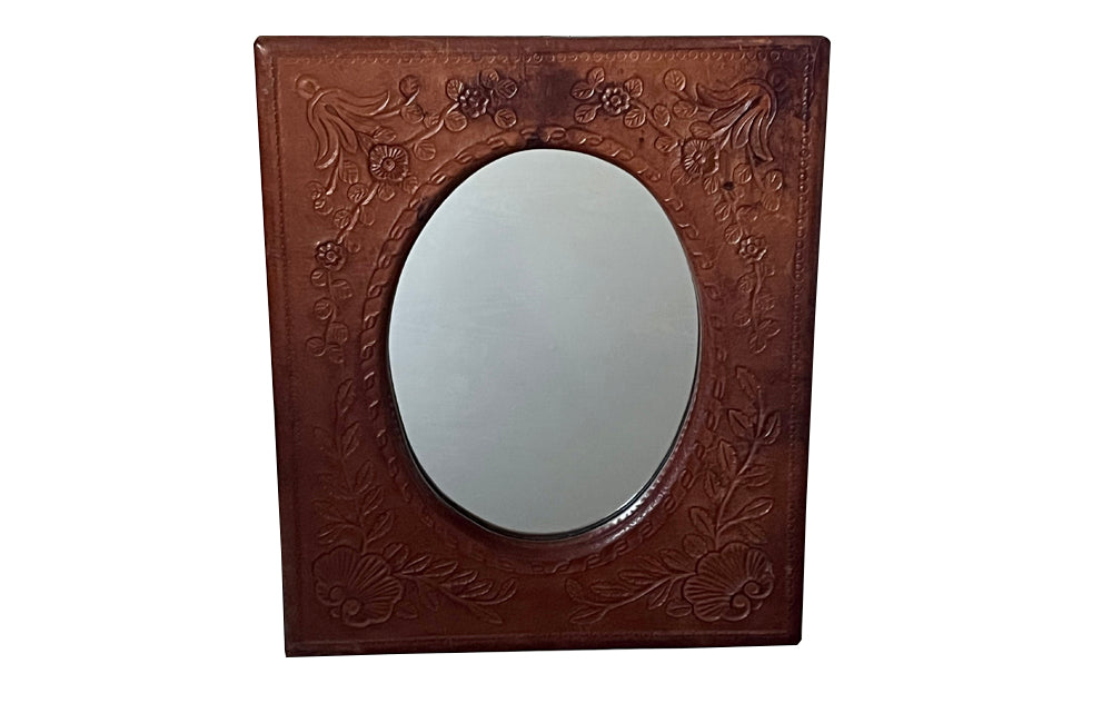 Mid-Century mirror with embossed leather frame Spanish