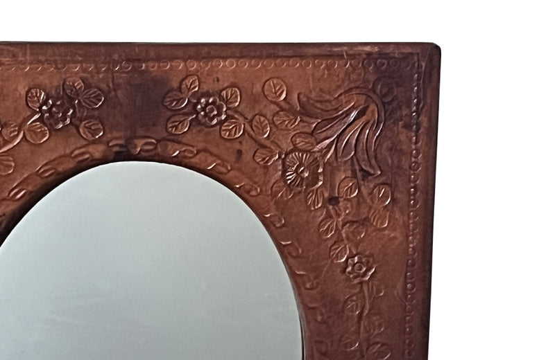 Mid-Century mirror with embossed leather frame Spanish