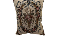 20th Century French Neo-Classical Revival cushion featuring a classic floral basket motif with ribbon detailing