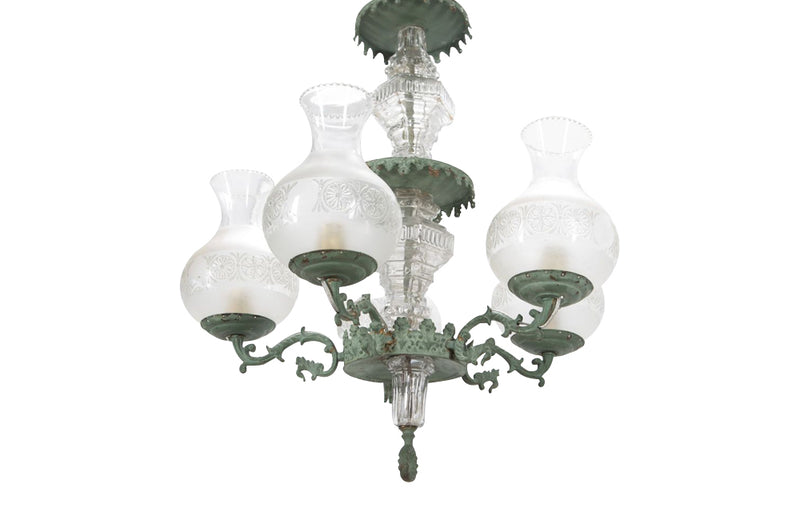 Beautiful French 19th Century four tiered gilt brass chandelier with verdigris finish