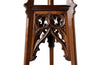 French 19th century walnut sculpture stand with rotating top and a lower shelf all beautifully carved in the Neo-Gothic style