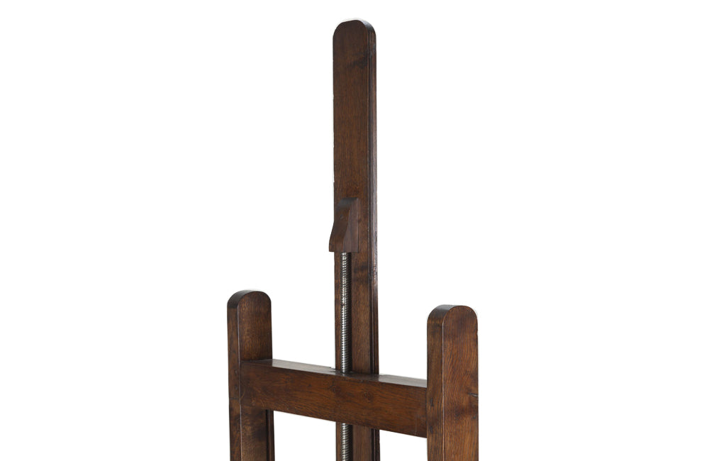 French, oak artist's easel with hand crank mechanism for adjusting height with iron turning screw circa 1900