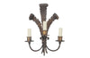 Metal wall light with three tied ostrich feathers and three branched arm bulb holders.