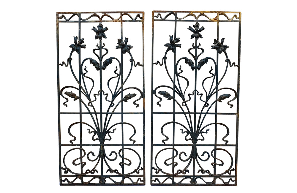 Pair of beautiful 19th century Art Nouveau wrought iron grills decorated with lilies.