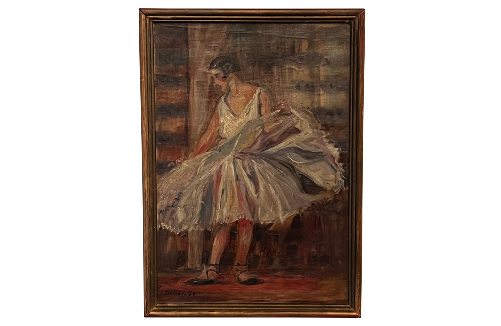 Charming portrait of a ballet dancer signed to the lower left corner by the artist, Delobre and dated 1924.