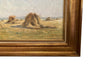 19th century framed, oil on canvas landscape painting of a field with haystacks - French Antiques