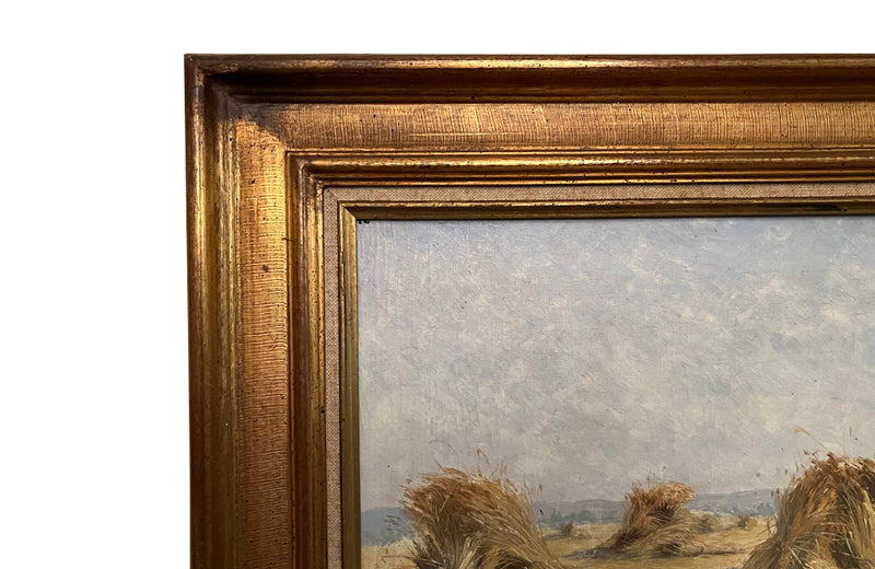 19th century framed, oil on canvas landscape painting of a field with haystacks - French Antiques