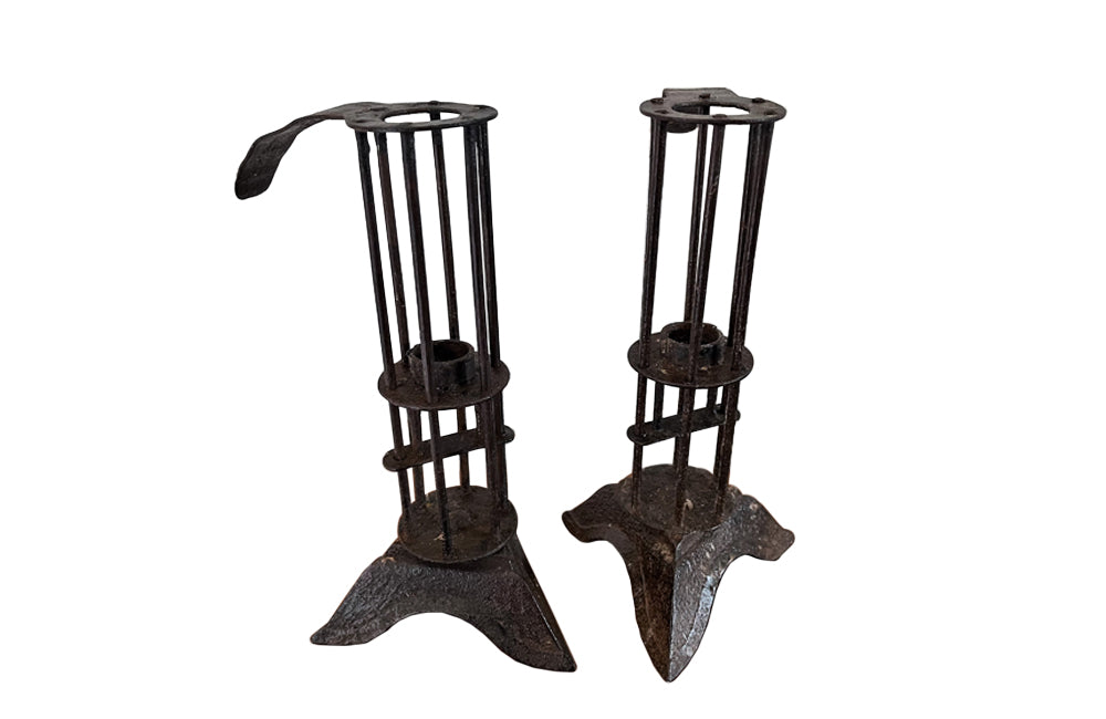 Pair of iron 'rat de cave' cellar candlesticks. 