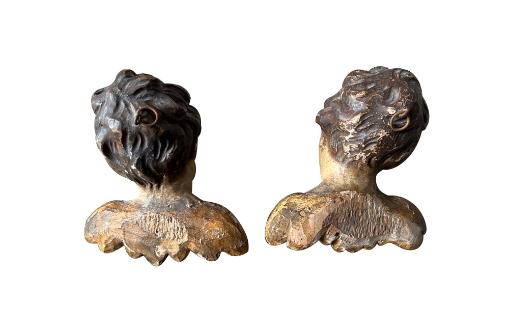 Pair of Italian Antique carved angel heads with wings.