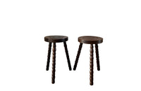 Pair of French vintage tripod stools with bobbin carved legs.