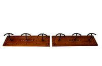 pair of French wooden and iron coat racks with faux bamboo decoration circa 1900