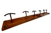 pair of French wooden and iron coat racks with faux bamboo decoration circa 1900