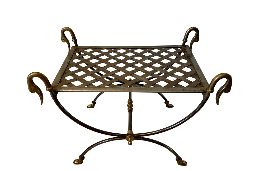 Pair of elegant steel and brass curule stools attributed to Maison Jansen 