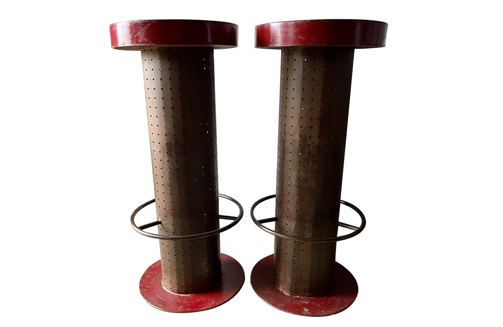 Pair of vintage iron 1960's French bar stools with circular foot rests. 