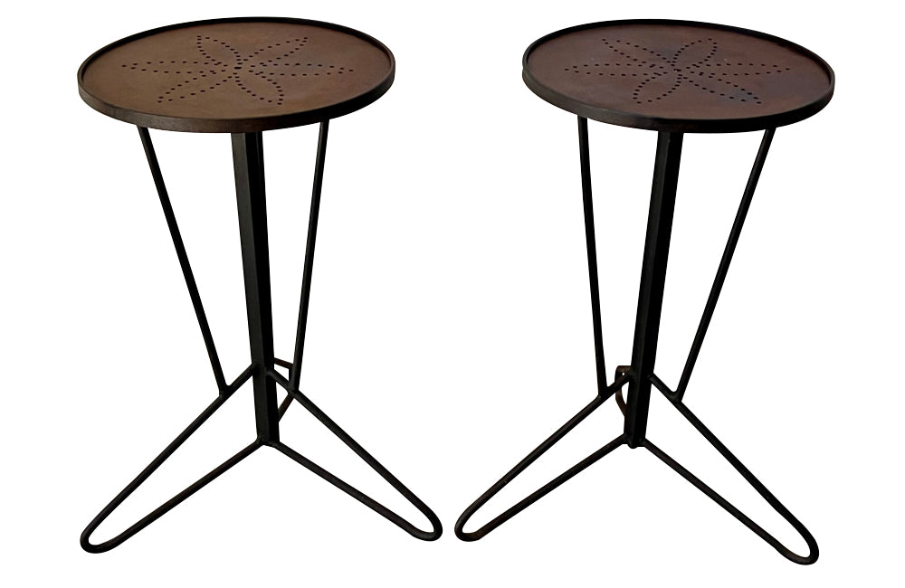 Pair of mid century iron round martini or occasional tables.