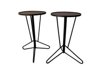 Pair of mid century iron round martini or occasional tables.