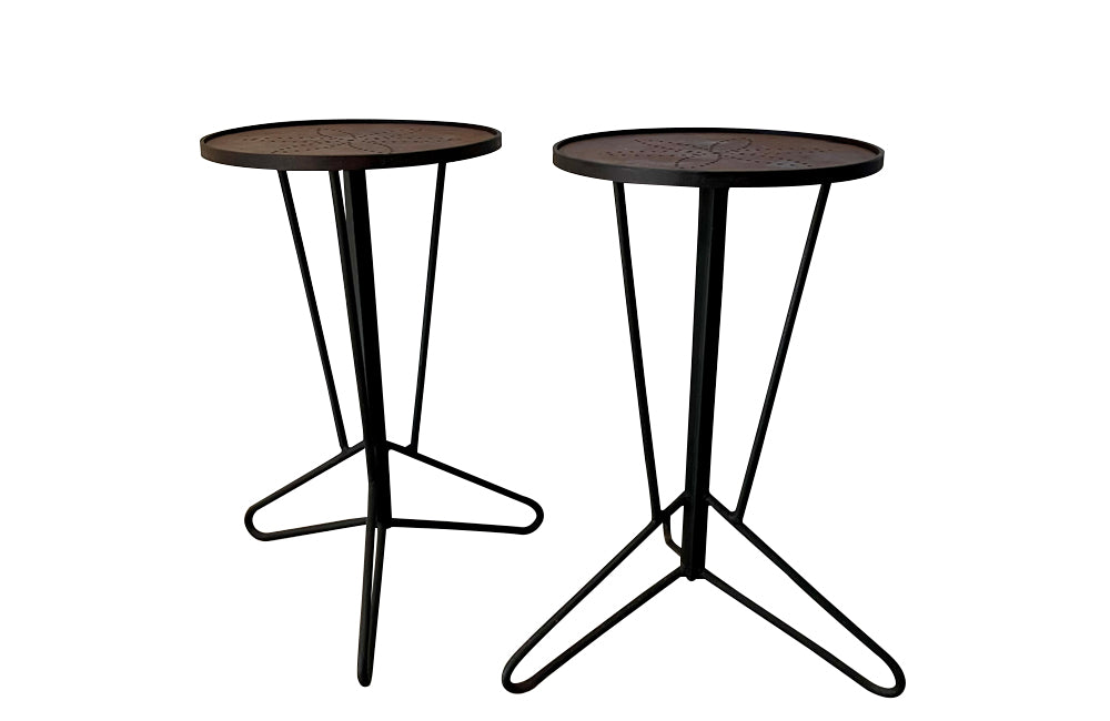 Pair of mid century iron round martini or occasional tables.