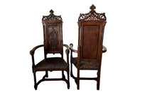 Pair of tall French oak ornately carved armchairs in the Neo-Gothique style.