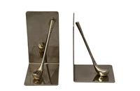 Pair of fun 20th century fun silver plate bookends decorated with with golf clubs.