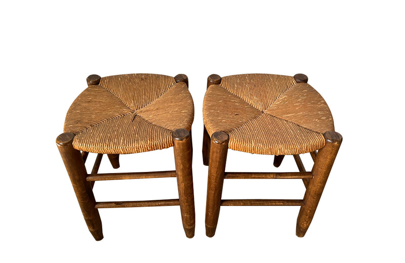 Pair of Charlotte Perriand style strawed seat beech stools