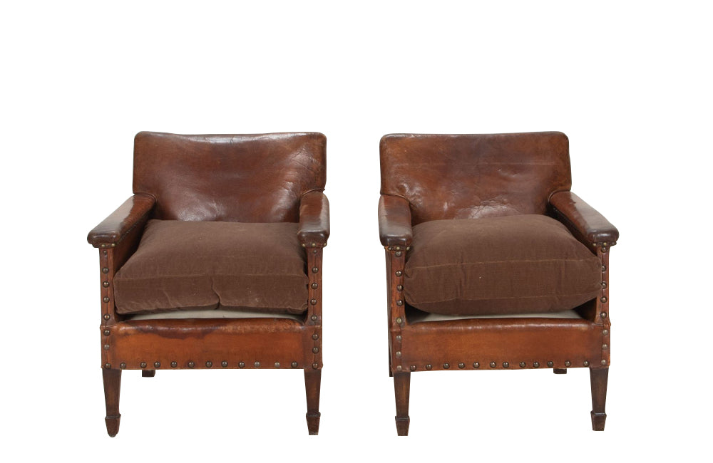 Charming, pair of 1920s French petite studded leather club chairs.