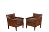 Charming, pair of 1920s French petite studded leather club chairs.