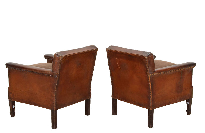 Charming, pair of 1920s French petite studded leather club chairs.