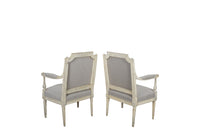 air of 19th century, French open 
armchairs in the Neo-Classical style. Reupholstered in linen