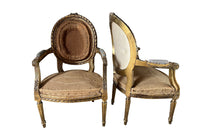 Elegant 19th century pair giltwood carved open armchairs in the Louis XVI style.