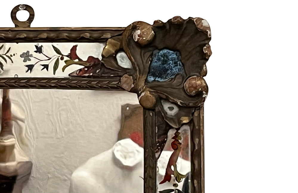 Beautiful rare pair of small 19th century Italian carved giltwood and verre eglomise mirror