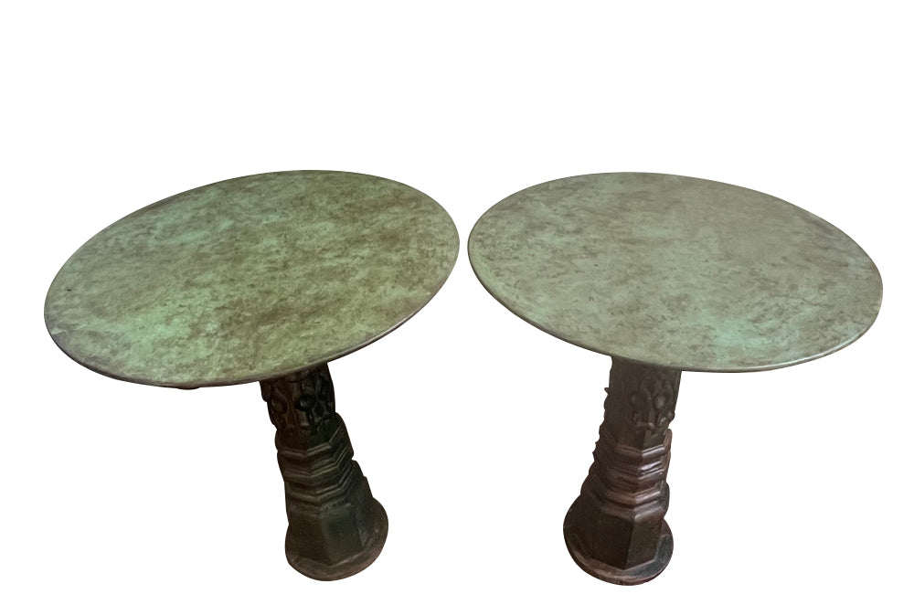 Decorative pair of French cast iron columnar based gueridon tables.