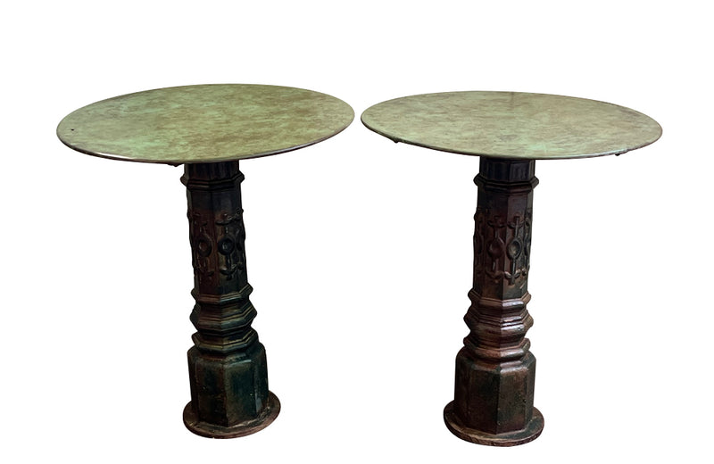 Decorative pair of French cast iron columnar based gueridon tables.