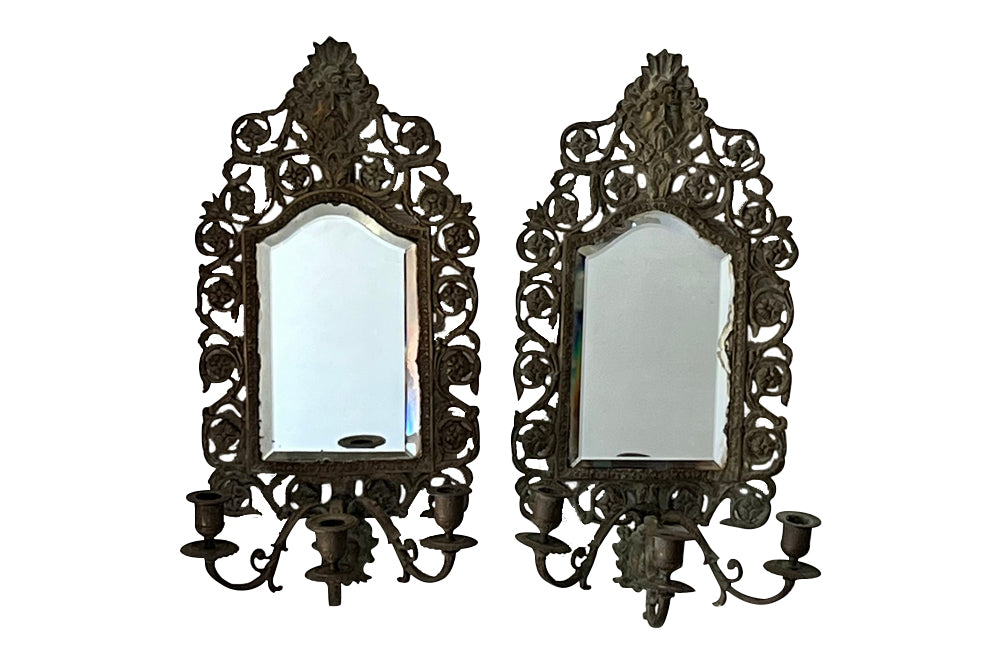 Antique mirrors French Neo-classical revival bronze wall sconces, with three branched candle holders. French antiques