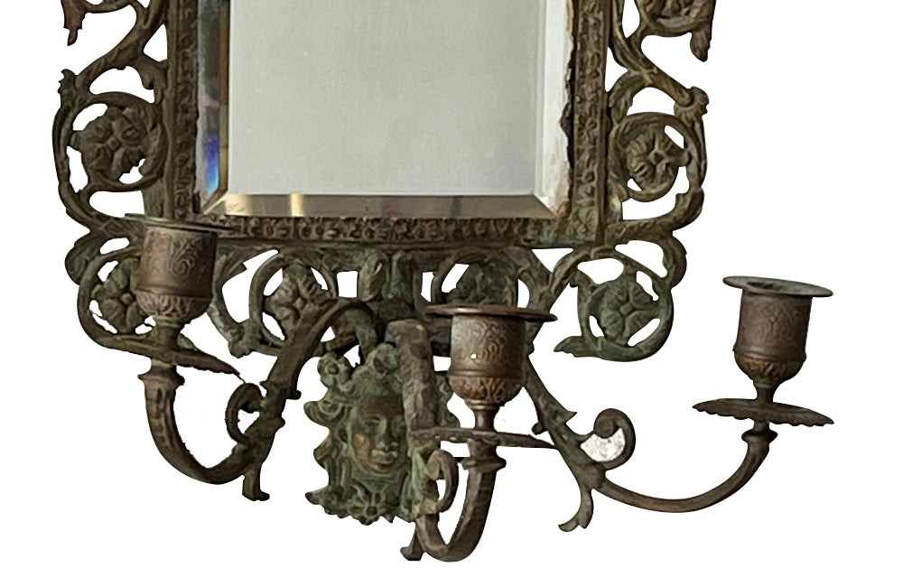 Antique mirrors French Neo-classical revival bronze wall sconces, with three branched candle holders. French antiques.