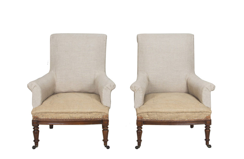 Pair of elegant large late 19th Century French country house armchairs with scrolled backs.