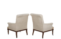 Pair of elegant large late 19th Century French country house armchairs with scrolled backs.
